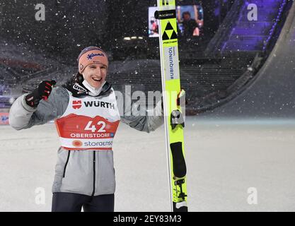 Karl Geiger from Germany celebrates his third position in the FIS World ...