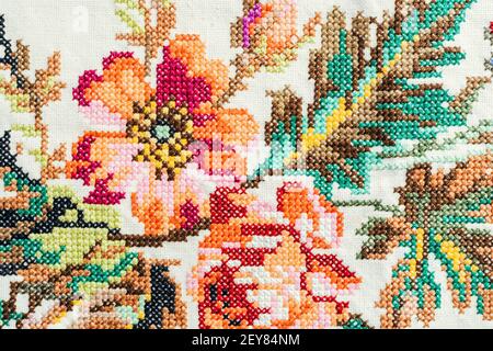 cross stitch flower. close-up. background Stock Photo