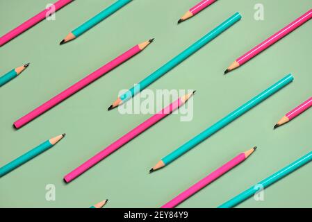 Geometric pattern made with colored pencils on green background Stock Photo