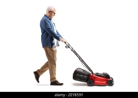 Full length profile shot of a casual mature man mowing isolated on white background Stock Photo