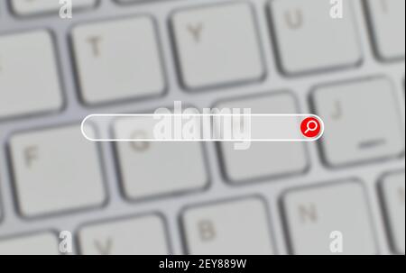 Search bar concept on blurred keyboard background. Stock Photo