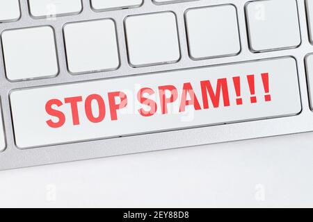 stop spam concept on keyboard button. Close up. Stock Photo