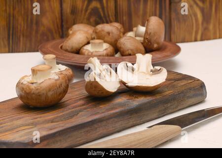 Large edible mushrooms. Royal brown champignons close-up. Stock Photo