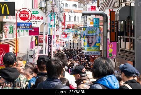 Crowd of people walk down the Omotesando Harajuku on Sunday afternoon at Jingumae Shibuya Tokyo Japan. Stock Photo
