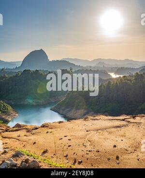 Beautiful sunset over Piedra del Peñol in Guatapé, Antioquia, Colombia Stock Photo