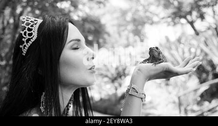 JOHANNESBURG, SOUTH AFRICA - Jan 05, 2021: Johannesburg, South Africa - February 08 2013: Princess kissing a frog in a garden Stock Photo