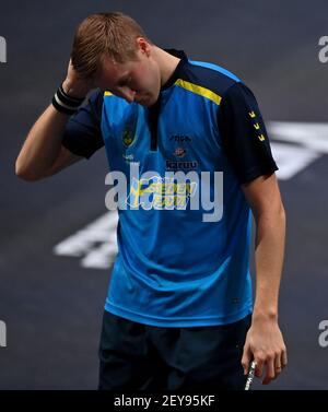 Doha. 5th Mar, 2021. Mattias Falck of Sweden reacts during the men's singles quarterfinal against Dimitrij Ovtcharov of Germany at WTT Contender Doha in Doha, Qatar on March 5, 2021. Credit: Nikku/Xinhua/Alamy Live News Stock Photo