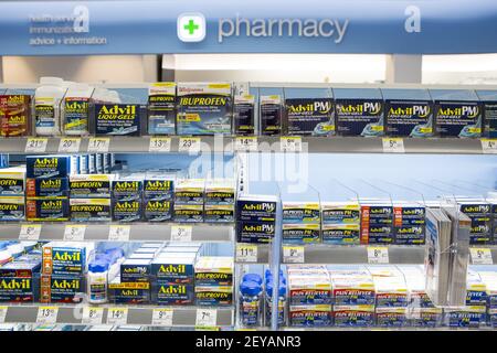 Advil Ibuprofen products on display in the pharmacy section of the