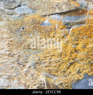 Rocks stone and red orange gneiss in the wall of morocco Stock Photo