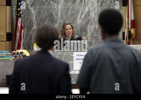 Broward County public defender Rudy Morel stands in Judge Michele