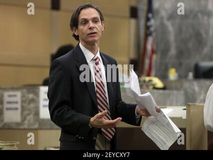 Broward County public defender Rudy Morel stands in Judge Michele