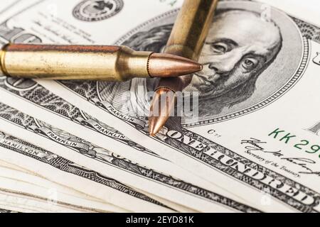 Two Bullets on Dollars Stock Photo