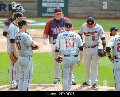 Minnesota Twins pitcher Ryan Pressly (57) throws live batting