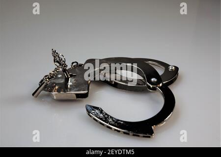 handcuffs and keys Stock Photo