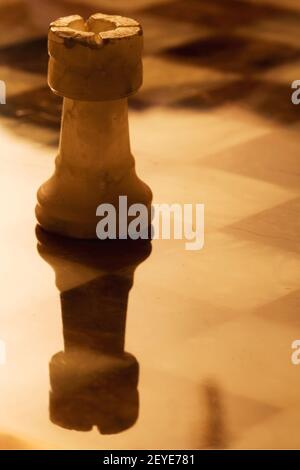 Abstrac gold tower in  chess board Stock Photo