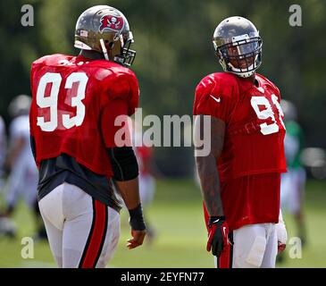 Tampa Bay Buccaneers defensive end Da'Quan Bowers (91) returns a fumble  against the Washington Redskins during the first quarter of their preseason  game at FedEx Field in Landover, MD, Thursday, September 1