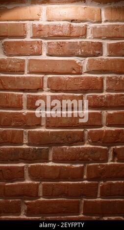 Real old polished brick wall texture. Background image Stock Photo