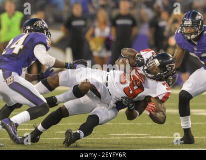 Photo: Baltimore Ravens Matt Lawrence runs against the Washington Redskins  in Baltimore - BAL20090813337 