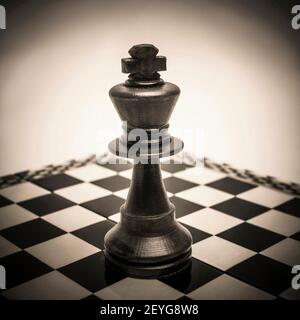 King chess piece on chessboard Stock Photo