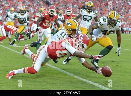 Kansas City Chiefs Frankie Hammond Jr. (85) returns a punt during an NFL  preseason football game against Green Bay Packers Johnathan Franklin (23)  Chiefs Thursday, Aug. 29, 2013, in Kansas City, Mo. (