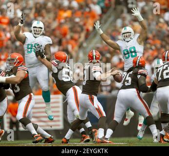 Miami Dolphins defensive tackle Jared Odrick (98) drinks Gatorade