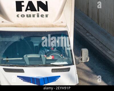 Bucharest Romania 02 22 2021 A Car Or Van With Fan Courier Logo On The Street Fan Courier Is The Largest Courier Delivery And Postal Company In Stock Photo Alamy