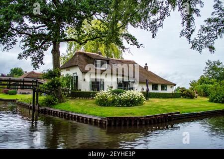 Giethoorn, Netherlands - July 6, 2019: Traditional Dutch house in the village of Giethoorn in the Netherlands Stock Photo