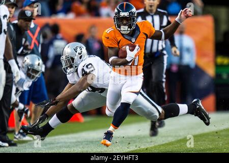 Denver Broncos wide receiver Trindon Holliday (11) returns a kickoff 23  yards during first quarter action against the Baltimore Ravens in the NFL  AFC Divisional Playoff game at Sports Authority Field in