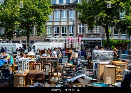 Antwerp, Belgium - July 12, 2019: Street auction in Antwerpen (Antwerp) where people buy and sell used items Stock Photo
