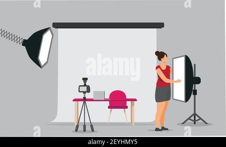 A woman vlogger setting up a recording session interacting with recording equipment and about to shoot a video. Stock Vector