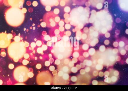 Christmas festive background. Blurred Christmas background, festive Christmas multicolor bokeh background. Stock Photo