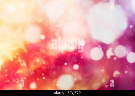 Abstract use of light color blur bokeh for background, abstract background. Bokeh light, shimmering blur lights on red. Stock Photo