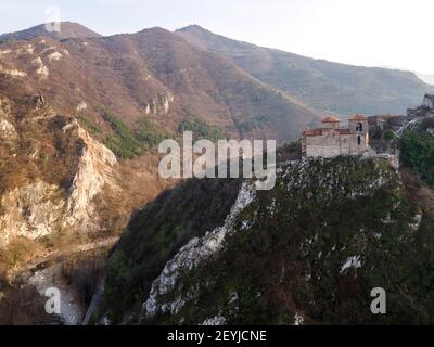 Aerial sunset view of ruins of Medieval Asen's Fortress, Asenovgrad, Plovdiv Region, Bulgaria Stock Photo