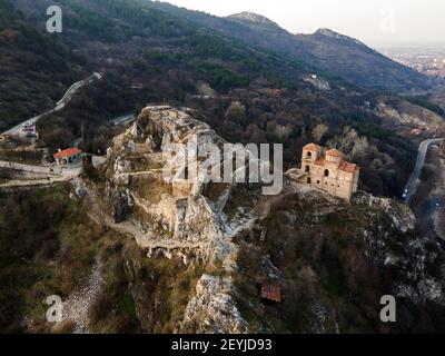 Aerial sunset view of ruins of Medieval Asen's Fortress, Asenovgrad, Plovdiv Region, Bulgaria Stock Photo