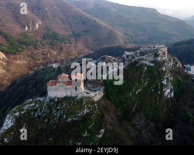 Aerial sunset view of ruins of Medieval Asen's Fortress, Asenovgrad, Plovdiv Region, Bulgaria Stock Photo