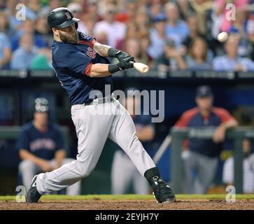 Shirtless Mike Napoli celebrates with helmeted Jonny Gomes 