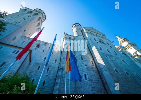 Beautiful and stunning low angle view of the famous Neuschwanstein Castle in Schwangau, Bavaria, Germany, Europe Stock Photo