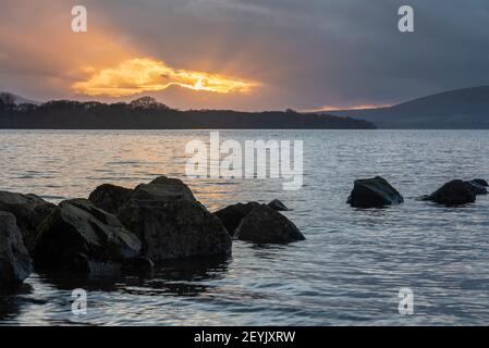 Majestic landscape image of Milarrochy Bay on Loch Lomond in Scottish Highlands with stunning Winter evening ligh Stock Photo
