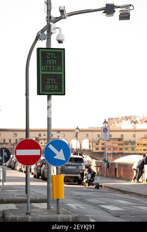 Florence, Italy - 2021, February 21: Limited traffic area, near Ponte Vecchio. Warning lighted sign. Stock Photo