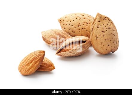 Group of almonds with shell isolated on white - clipping path included Stock Photo