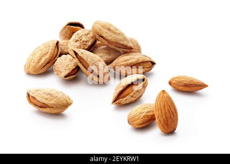 Group of almonds in shell isolated on white background Stock Photo