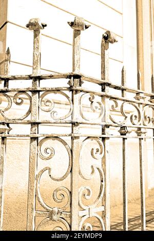 Rusty balauster acces  abstract handrail in the white concrete wall and shadow Stock Photo