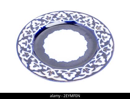 Asian plate with national circular ornament. Isolated on a white background. Stock Photo