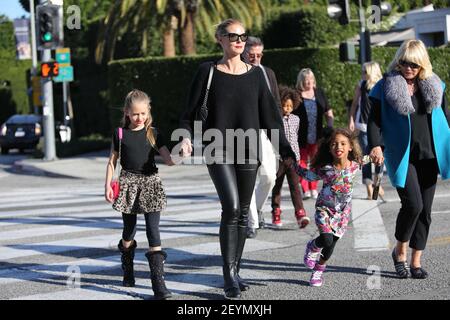 Heidi Klum takes her family to Cecconis Restaurant on the corner of