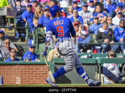 Mar 31, 2019: Chicago Cubs shortstop Javier Baez #9 jersey with the Chicago  Cubs logo at first base during an MLB game between the Chicago Cubs and the  Texas Rangers at Globe