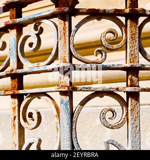 Rusty balauster acces  abstract handrail in the white concrete wall and shadow Stock Photo