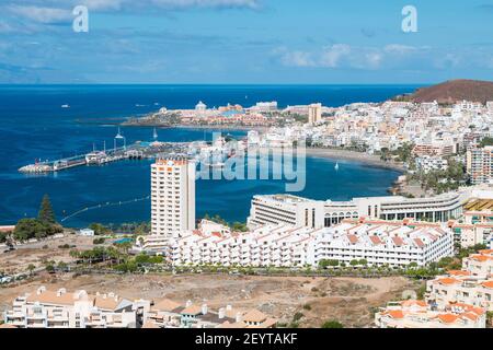 Los Cristianos harbor in the south west of Tenerife, Spain and La Gomera in the background. Stock Photo