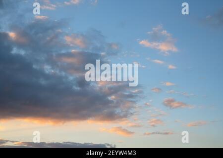Evening sky with pastel-colored clouds Stock Photo