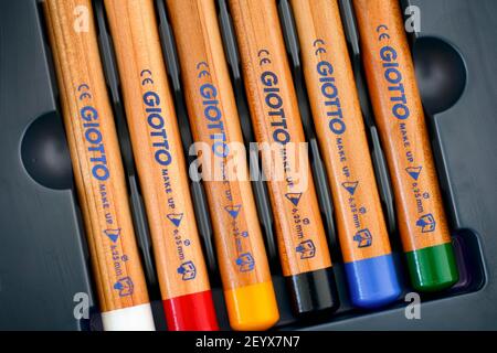 Tambov, Russian Federation - March 04, 2021 Six colored Giotto Make Up Cosmetic Pencils in a row in gray tray Stock Photo