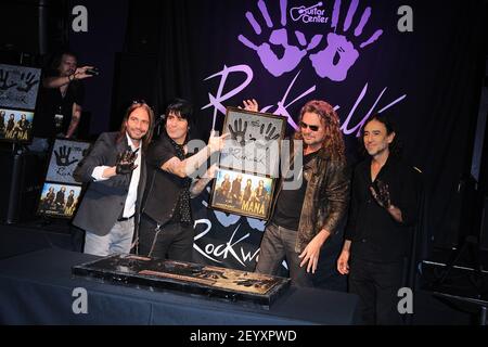 Fher Olvera Multi-Platinum and Grammy Winning Mexican Rock band 'Mana' are  inducted into Guitar Center's Historic RockWalk at Stock Photo - Alamy